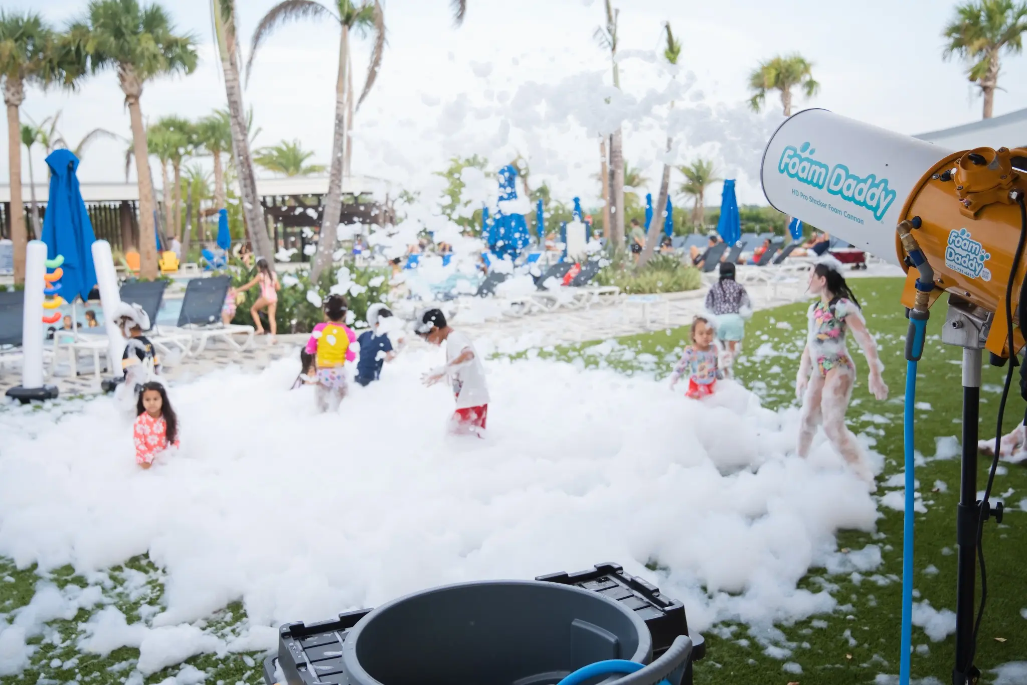 Professional foam cannon operating at a resort foam party in Central Florida